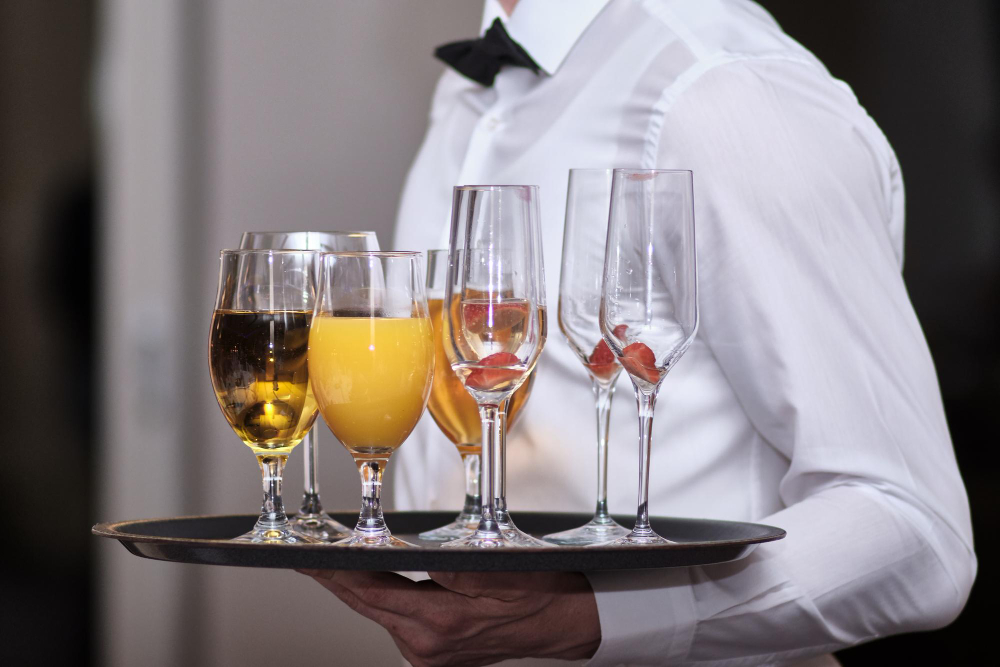 waiter-with-tray-drinks-juices-wine-champagne-party